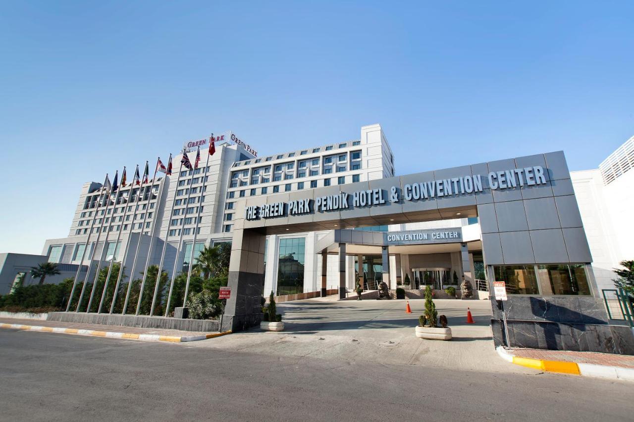 איסטמבול The Green Park Pendik מראה חיצוני תמונה The photo shows the exterior of a modern hotel and convention center. The building has a sleek design and features multiple stories. In the foreground, there is a large entrance with the name "Green Park Pendik Hotel & Convention Center" prominently 